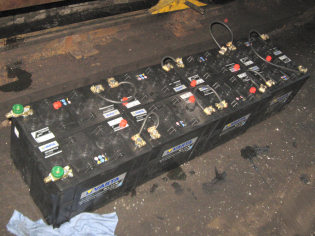 Batteries connected up on the floor